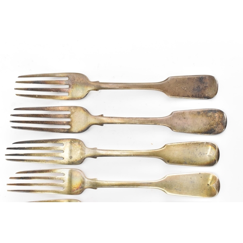 18 - Six 19th century silver table forks, with various makers marks and date letters, each in the fiddle ... 