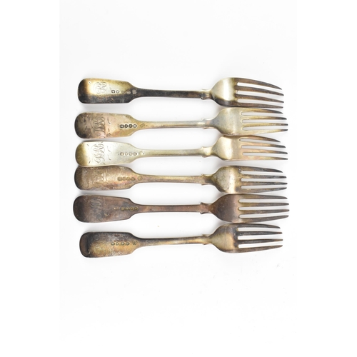 18 - Six 19th century silver table forks, with various makers marks and date letters, each in the fiddle ... 