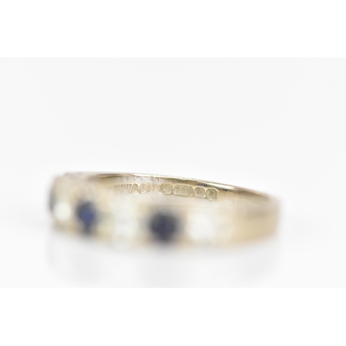 181 - An 18ct white gold half eternity ring, set with three sapphires, each approx 3.3mm x 3mm and four ro... 