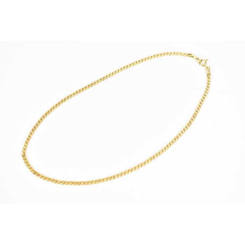 186 - An 18ct yellow gold serpentine link chain necklace, having a bolt ring clasp, stamped 750, 43cm, 15.... 