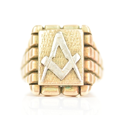 204 - A 9ct gold gents masonic signet ring, cast with a masonic symbol raised on a textured plaque, ring s... 