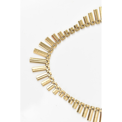 206 - A 9ct gold Cleopatra style fringe necklace, having graduated elliptical bars and an open box clasp, ... 