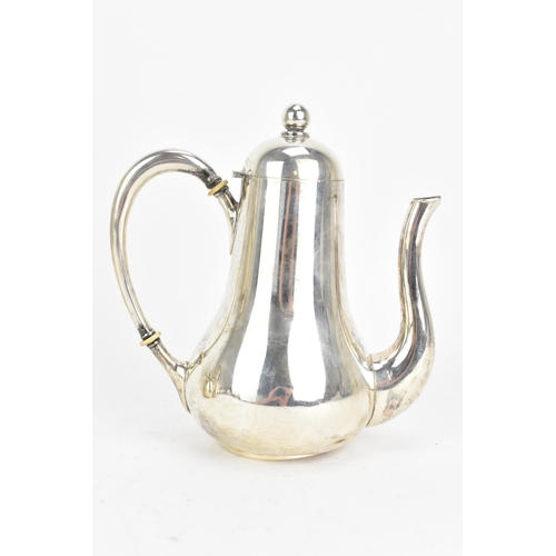 21 - An early 20th century 800 silver three piece tea service, consisting of a teapot 17cm high x 16.5cm ... 