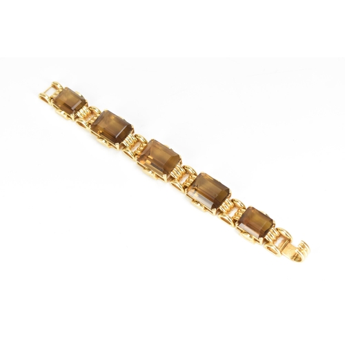 211 - A vintage 18ct gold cocktail bracelet, inset with five graduating faceted cut smokey quartz stones i... 