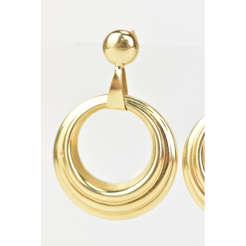 212 - A pair of 14ct yellow gold hoop earrings, each having suspension rings and butterfly backs, stamped ... 