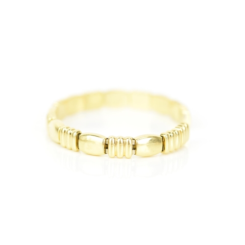 215 - An 18ct yellow gold bangle, expanding with seventeen links, 69mm x 55.5mm, stamped 750, 22.5 grams
I... 