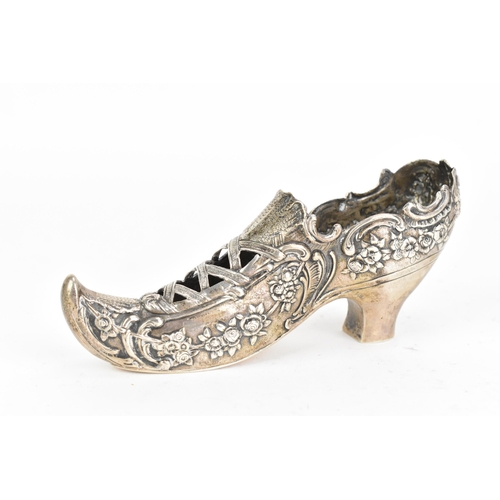 22 - A German early 20th century silver model of a ladies shoe, Hanau, import marks for Chester 1907, cas... 