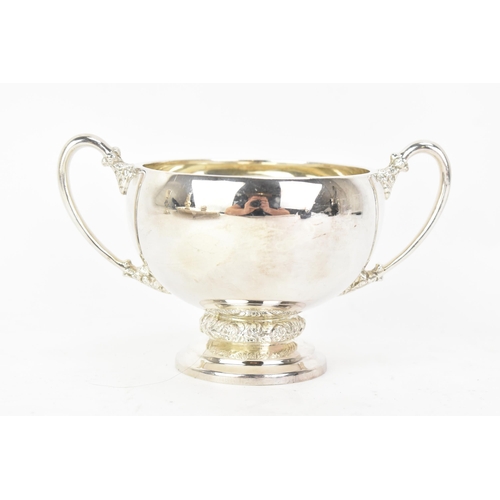 221 - An Elizabeth II silver twin handled sugar bowl, by Harrods Ltd, hallmarked Sheffield 1962, cast with... 