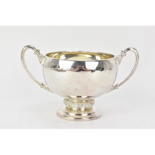 221 - An Elizabeth II silver twin handled sugar bowl, by Harrods Ltd, hallmarked Sheffield 1962, cast with... 