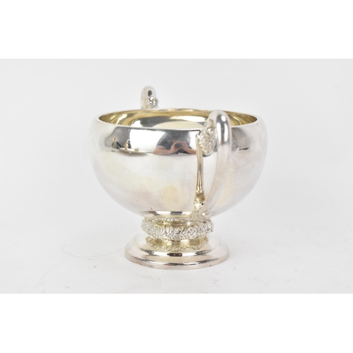 221 - An Elizabeth II silver twin handled sugar bowl, by Harrods Ltd, hallmarked Sheffield 1962, cast with... 