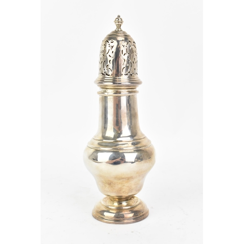 223 - An early 20th century silver sugar castor, makers marks and hallmarks rubbed, having a turned finial... 