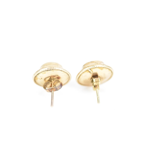 228 - A pair of Victorian Etruscan revival 9ct gold earrings, each of circular form inset with a cluster o... 