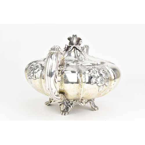 23 - A Victorian silver teapot, by Joseph Angell I & Joseph Angell II, hallmarked London 1844, the scroll... 