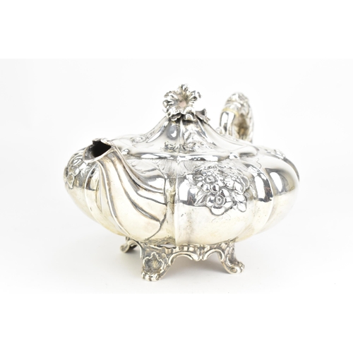 23 - A Victorian silver teapot, by Joseph Angell I & Joseph Angell II, hallmarked London 1844, the scroll... 