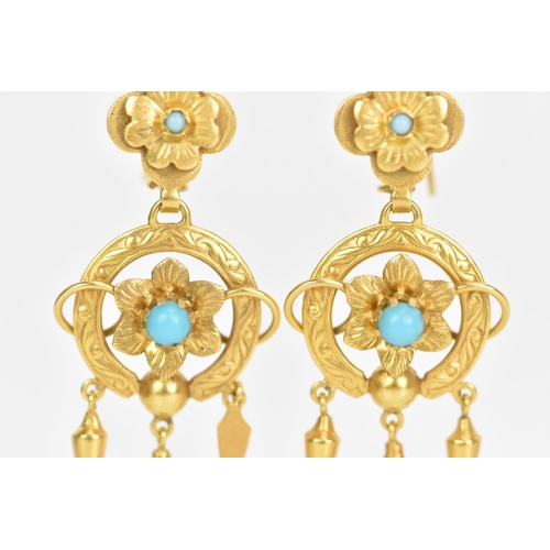 230 - A pair of Victorian Etruscan style yellow metal earrings, each having three drops suspended by circu... 