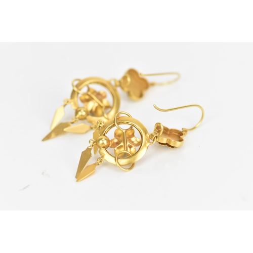 230 - A pair of Victorian Etruscan style yellow metal earrings, each having three drops suspended by circu... 