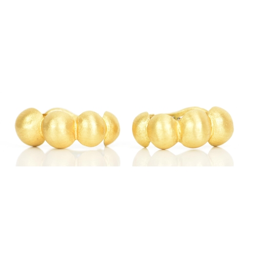 231 - A pair of 18ct yellow gold earrings, each designed as four graduated beads with lever backs, stamped... 