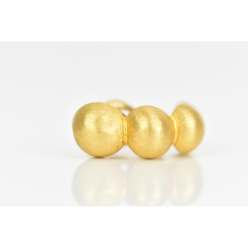 231 - A pair of 18ct yellow gold earrings, each designed as four graduated beads with lever backs, stamped... 