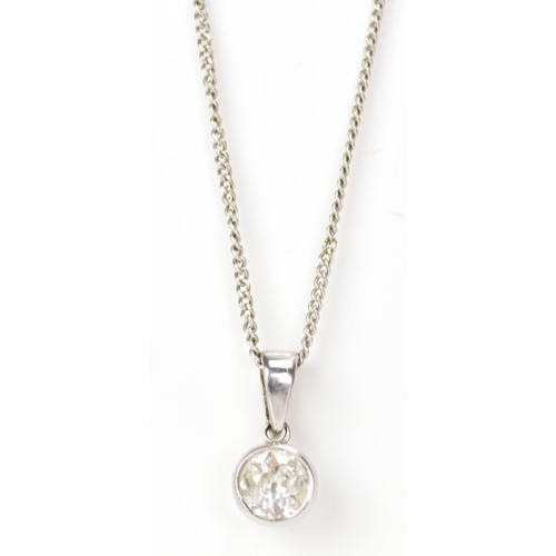 234 - An 18ct white gold and diamond necklace, the drop pendant inset with a single brilliant cut diamond ... 