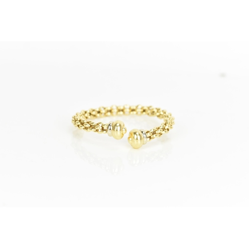 238 - An 18ct yellow gold bangle, possibly by Fope, having a chain link design and polished terminals, sta... 