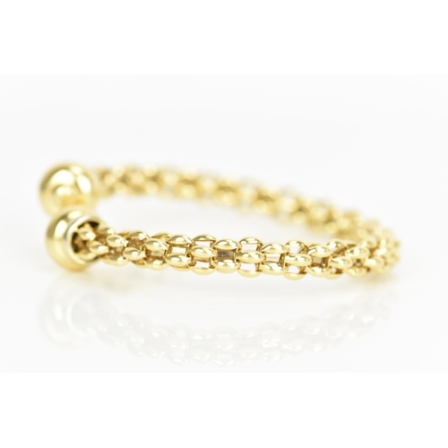 238 - An 18ct yellow gold bangle, possibly by Fope, having a chain link design and polished terminals, sta... 