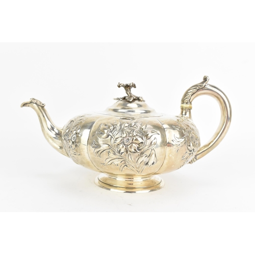 26 - A Victorian silver teapot, by John Samuel Hunt, hallmarked London 1847, the handle inset with ivory ... 