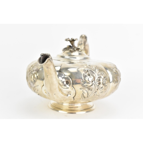 26 - A Victorian silver teapot, by John Samuel Hunt, hallmarked London 1847, the handle inset with ivory ... 