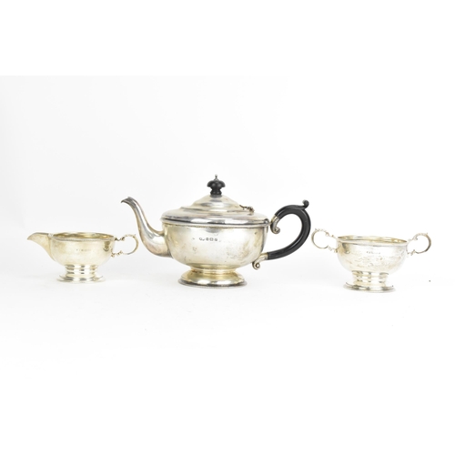 31 - A George V silver three piece tea service, by Marson & Jones, hallmarked Birmingham 1930, consisting... 