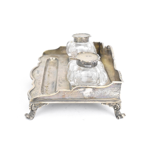 35 - A George V silver pen and ink stand, by William Hutton & Sons Ltd, hallmarked Sheffield 1920, having... 