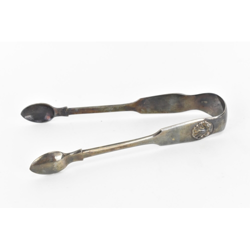 40 - Two George III silver berry spoons hallmarked London 1788, having fruit embossed bowls and bright-cu... 