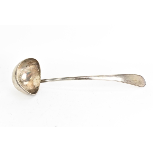 41 - A white metal serving ladle, having a reeded formed handle and stamped marks to the reverse, 36.5cm,... 