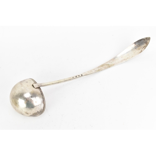 41 - A white metal serving ladle, having a reeded formed handle and stamped marks to the reverse, 36.5cm,... 