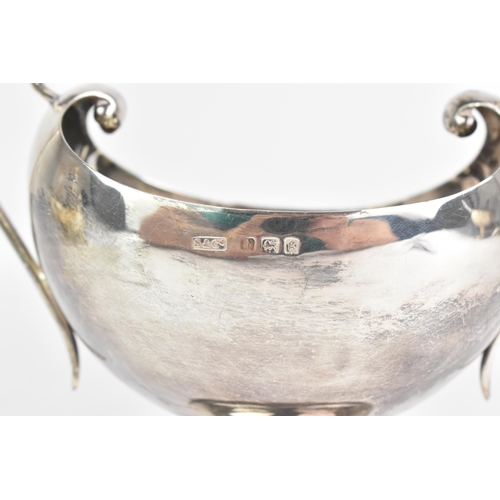 48 - An Edwardian silver twin handled sugar bowl, by Sydney & Co, hallmarked Birmingham 1906, having a sc... 