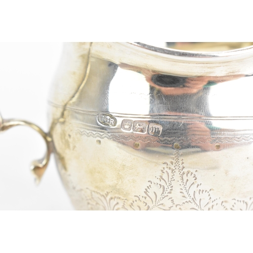 49 - An Edwardian silver milk jug, by Sutherland & Roden (George Guirren Rhoden), hallmarked Sheffield 19... 