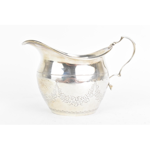 49 - An Edwardian silver milk jug, by Sutherland & Roden (George Guirren Rhoden), hallmarked Sheffield 19... 