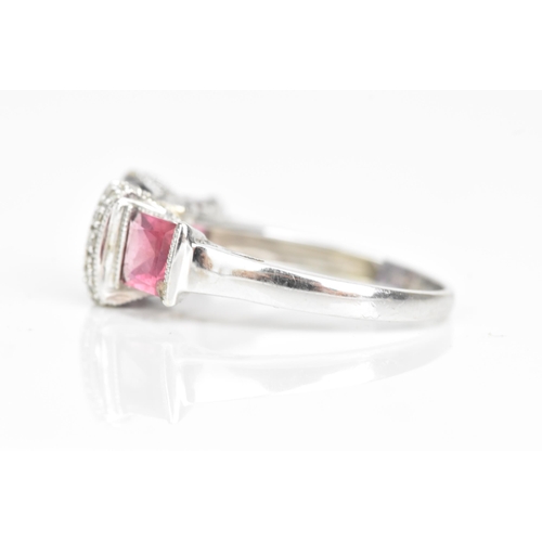 63 - A 14ct white gold amethyst and pink tourmaline dress ring, the cushion square cut amethyst 6.8mm wit... 