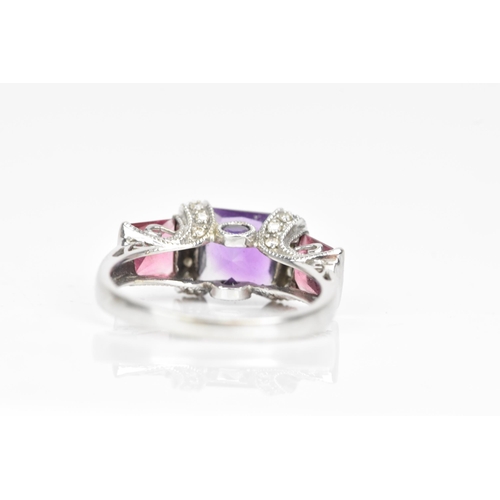 63 - A 14ct white gold amethyst and pink tourmaline dress ring, the cushion square cut amethyst 6.8mm wit... 