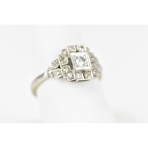 68 - An Art Deco 18ct white gold diamond engagement ring, set with a central brilliant cut approx 3mm dia... 