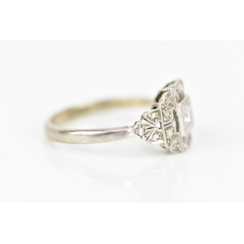 68 - An Art Deco 18ct white gold diamond engagement ring, set with a central brilliant cut approx 3mm dia... 