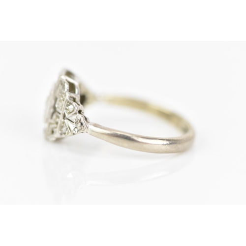 68 - An Art Deco 18ct white gold diamond engagement ring, set with a central brilliant cut approx 3mm dia... 