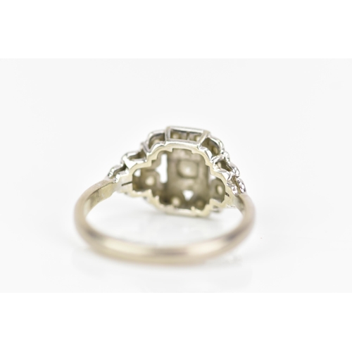 68 - An Art Deco 18ct white gold diamond engagement ring, set with a central brilliant cut approx 3mm dia... 