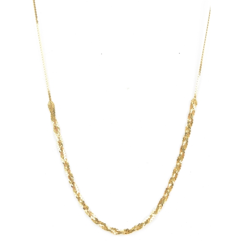 73 - An 18ct gold serpentine chain, having single strand to either end linked to strands of three entwine... 