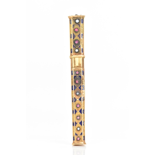 76 - A 19th century Egyptian revival gold needle case, of octagonal tapering form and embellished with bl... 