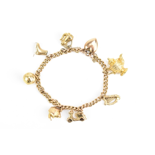 77 - A 9ct rose gold curb link charm bracelet, with various 9ct gold and yellow metal charms including a ... 