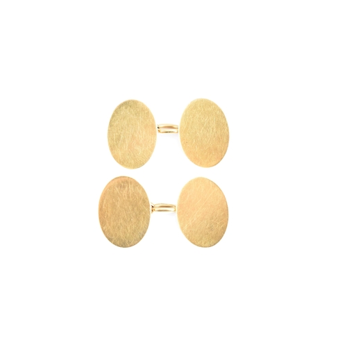 80 - A pair of 18ct gold cufflinks, each of oval shape with chain links, 18.2mm, 11.2 grams
If there is n... 