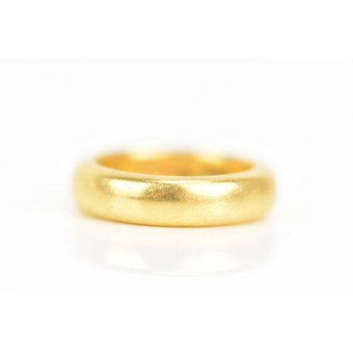 82 - An 18ct gold wedding band, ring size J, 10 grams
If there is no condition report shown, please reque... 