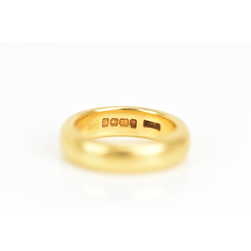 82 - An 18ct gold wedding band, ring size J, 10 grams
If there is no condition report shown, please reque... 