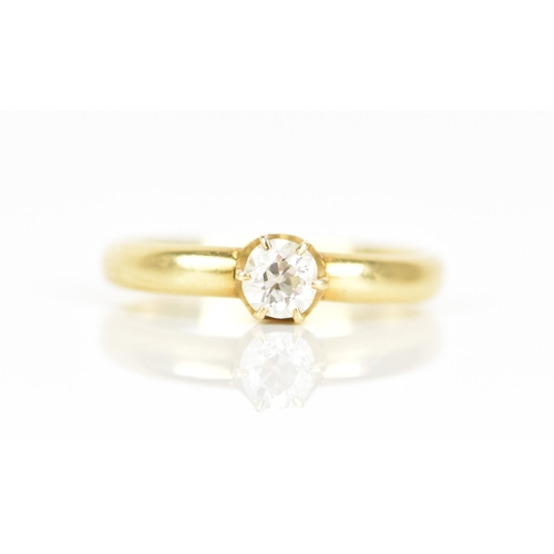 83 - A gold diamond engagement ring, the old cut diamond set in a six claw setting, approximately 0.5ct, ... 