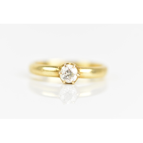 83 - A gold diamond engagement ring, the old cut diamond set in a six claw setting, approximately 0.5ct, ... 