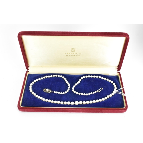 84 - A single strand Mikimoto cultured pearl necklace, with ninety-five spherical graduating cultured pea... 